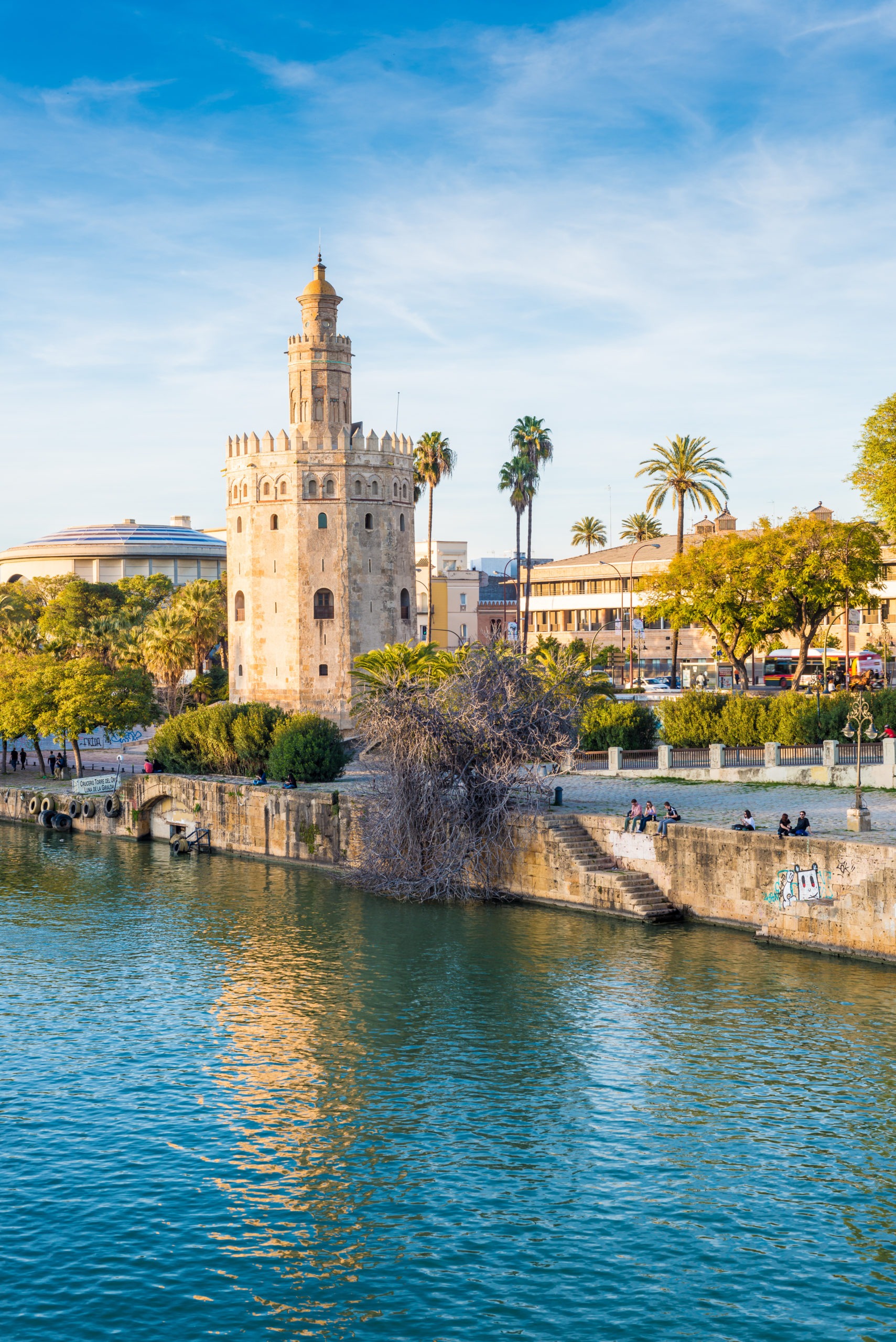SEVILLE, ES - MARCH 7, 2017: The Torre del Oro in Seville is an albarrana tower located on the left bank of the Guadalquivir River. It houses the Naval Museum of Seville.